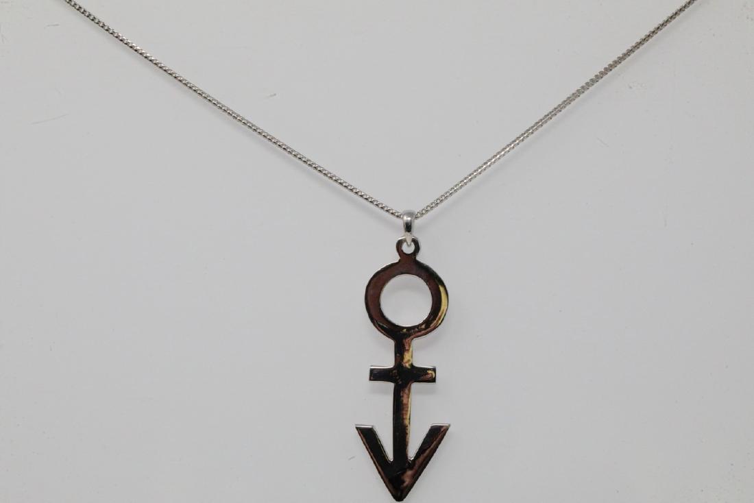 prince symbol necklace gold