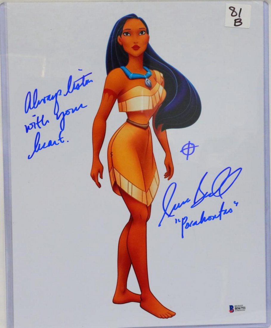 Irene Bedard "Pocahontas" Signed Photo W/Beckett COA: Irene Bedard "Pocahontas" Signed 11" x 14" Color Photo W/Beckett Authentication - This 11" x 14" color photograph depicts the animated character "Pocahontas" from the 1995 Walt Disney Pictures film of