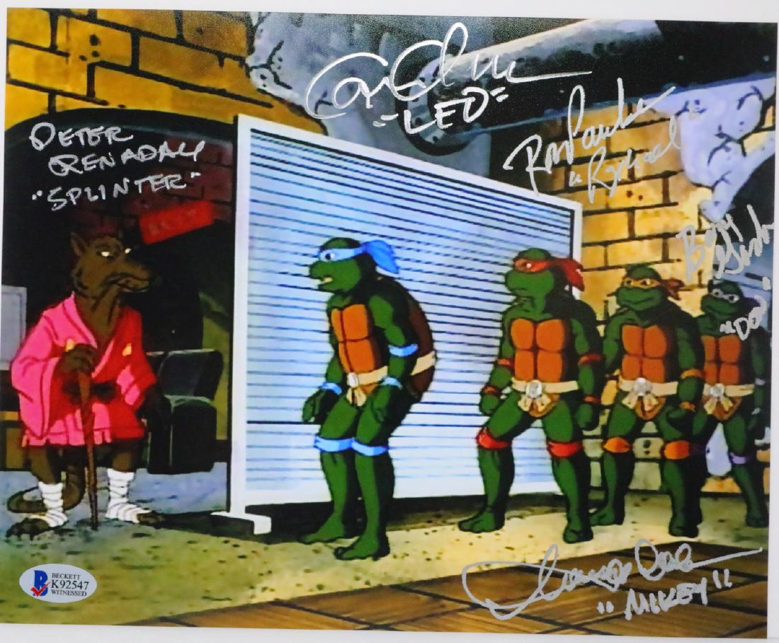 Teenage Mutant Ninja Turtles Signed Photo W/COA: Teenage Mutant Ninja Turtles Cast Signed 8" x 10" Photo W/Beckett Witnessed Authentication - This 8" x 10" photo depicts an image from the 1987 American animated television series "Teenage Mutant Ninj
