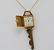 Cartier 18K Clock Key Pendant on 24" 18K Chain