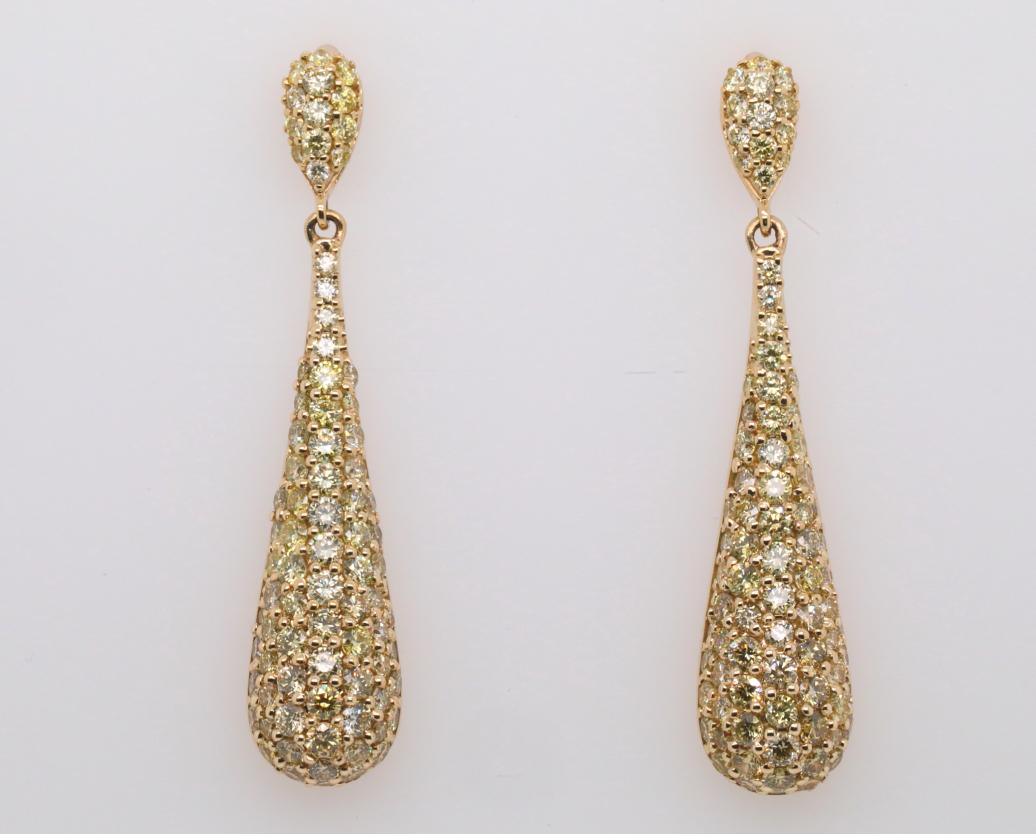 3.00ctw SI1-SI2 Yellow Diamond & 14K Earrings: 3.00ctw SI1-SI2 Yellow Diamond & Solid 14K Yellow Gold 1.75" Drop Earrings (Comes W/$10,500 Appraisal) - These lovely drop earrings are made of solid 14k yellow gold and are embellished with approxima