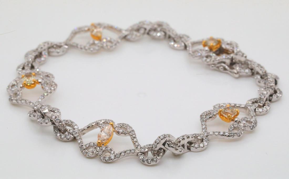 H. Emperor White & Yellow Diamond 14K Bracelet: H. Emperor 2.61ctw White & Yellow Diamond Solid 14K White/Yellow Gold Bracelet - This bracelet was made by H. Emperor Jewelry, and is made of solid 14k white and yellow gold. The bracelet is lined wit