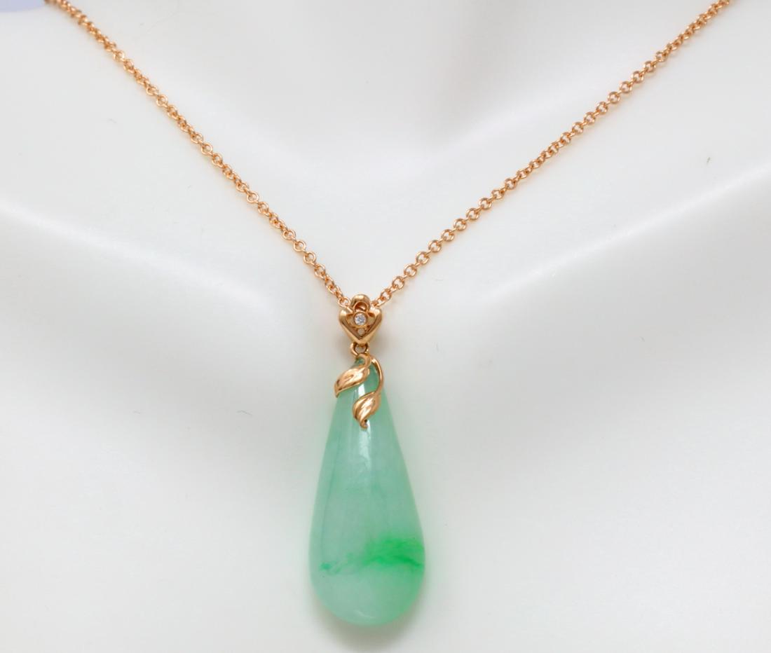 16.25ct Natural Type A Jadeite & 18K Necklace: 16.25ct Certified Natural Type A Jadeite & Solid 18K Rose Gold 18" Necklace W/NGI Report - This necklace was finely crafted of solid 18k rose gold and is comprised of a 1.25" pendant which hangs on an