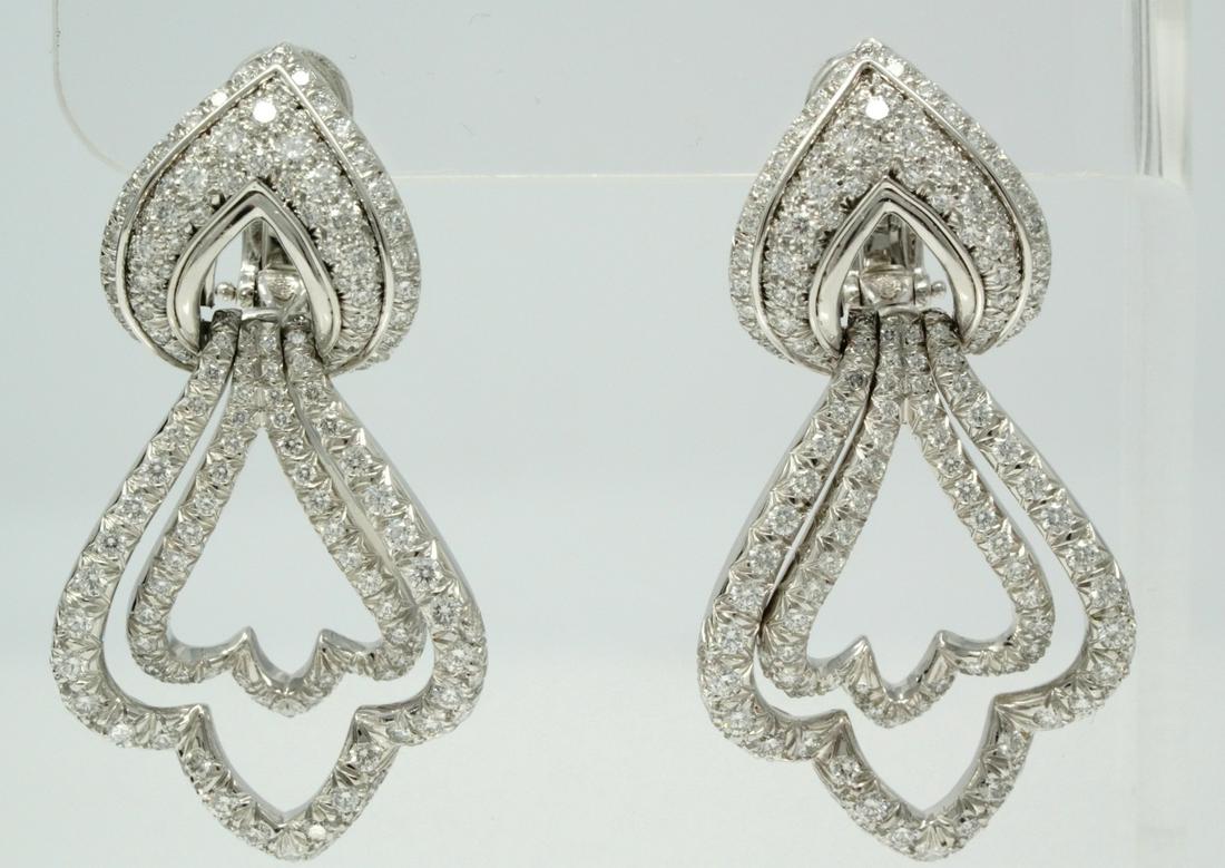Henry Dunay 4.00ctw VVS2-VS1/E-F Diamond & Solid: Henry Dunay 4.00ctw VVS2-VS1/E-F Diamond & Solid Platinum Earrings (Comes W/$15,500 Appraisal) - These gorgeous earrings ere made by world renowned, award-winning designer Henry Dunay. The earrings we