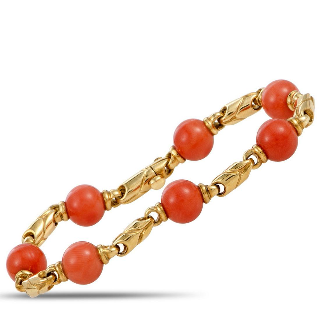 Bvlgari Red Coral Sphere 18K Yellow Gold Bracelet: Bvlgari Red Coral Sphere & Solid 18K Yellow Gold Bracelet (Comes W/$12,000 Appraisal) - This lovely bracelet was made by Bvlgari and was finely crafted of solid 18k yellow gold. The bracelet has a sim