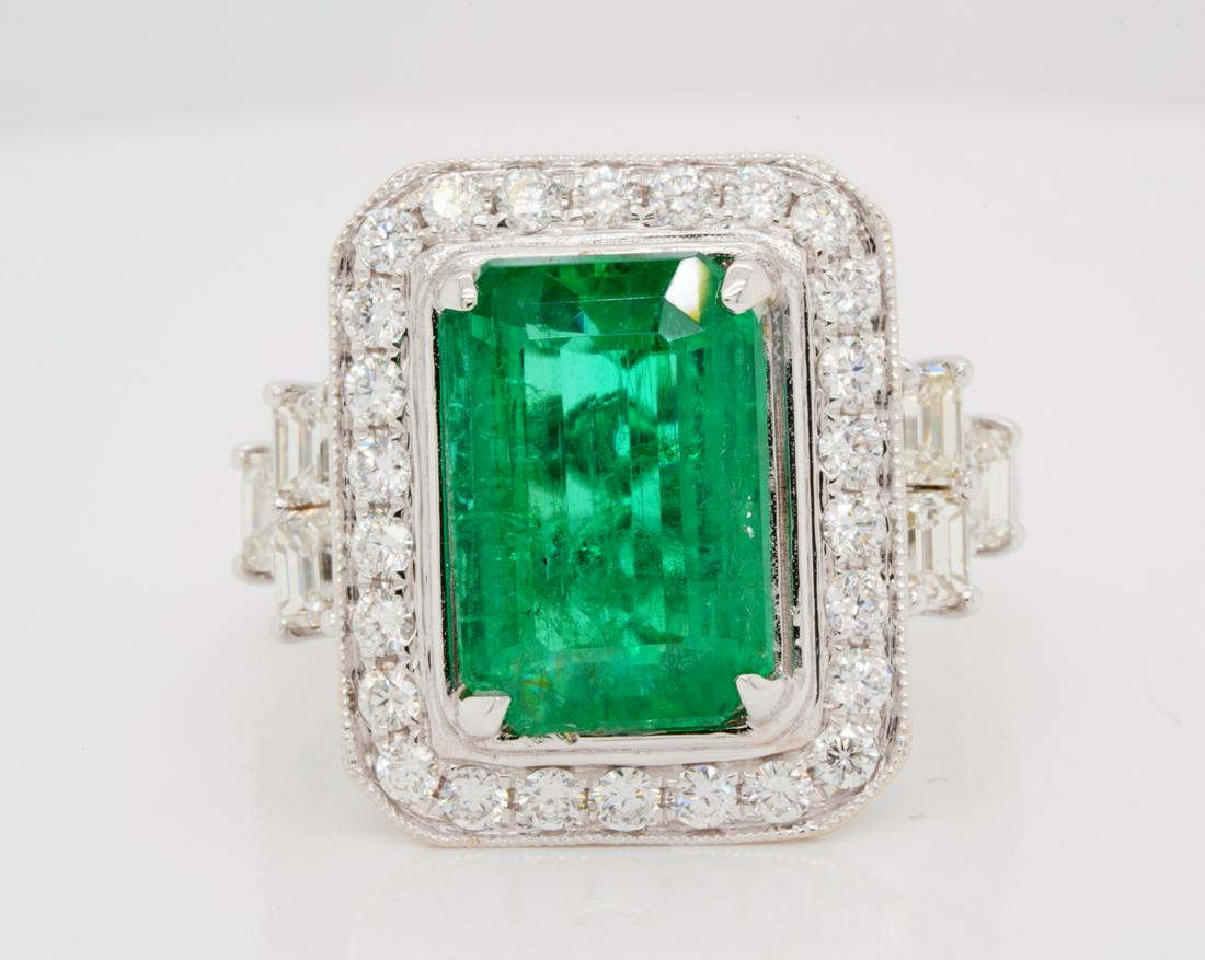 4.00ct Emerald, 1.50ctw VS1-VS2/G-H Diamond 18K Ring: 4.00ct Emerald, 1.50ctw VS1-VS2/G-H Diamond Solid 18K White Gold Ring - This gorgeous ring was finely crafted of solid 18k white gold and boasts a 4.00ct (approximate) emerald cut emerald which displa