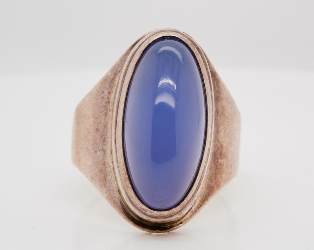 20.5mm Blue Chalcedony & Sterling Silver Ring: 20.5mm Blue Chalcedony Cabochon & Solid Sterling Silver Ring W/Maker's Mark - This lovely ring was crafted of solid sterling silver and boasts a beautiful 20.5mm x 9.5mm blue chalcedony cabochon. The