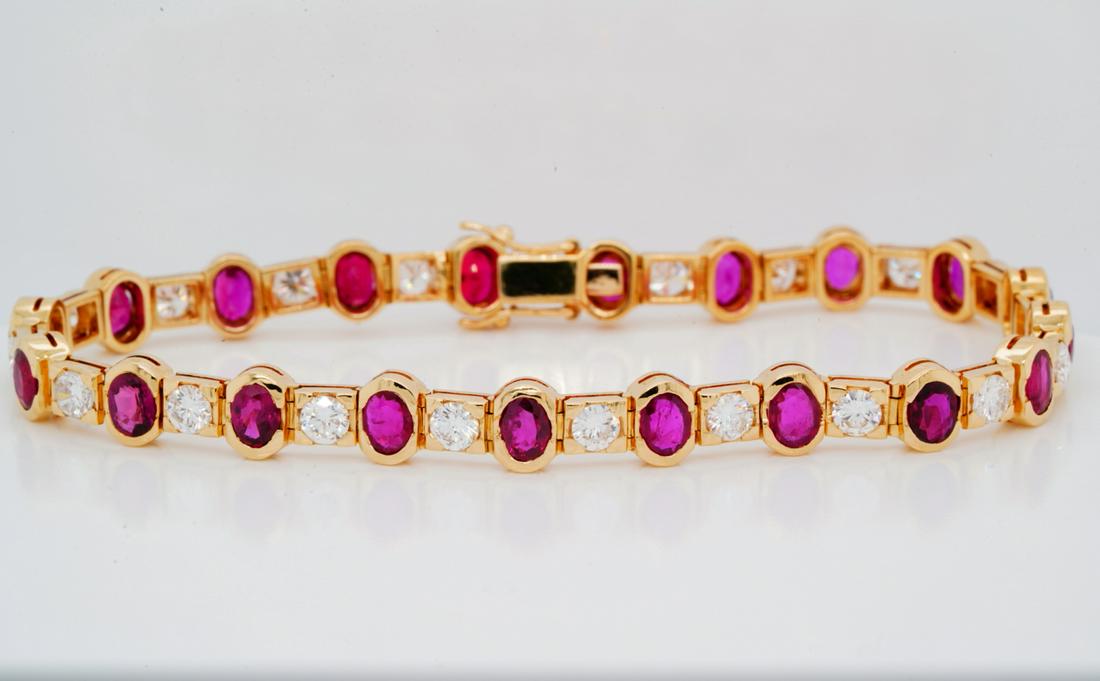 5.00ctw Ruby, 3.00ctw Diamond 18K 7.5" Bracelet: 5.00ctw Ruby, 3.00ctw VS1-VS2/G-H Diamond Solid 18K Yellow Gold 7.5" Bracelet - This beautiful bracelet was crafted of solid 18k yellow gold and is embellished with a plethora of gleaming rubies and d
