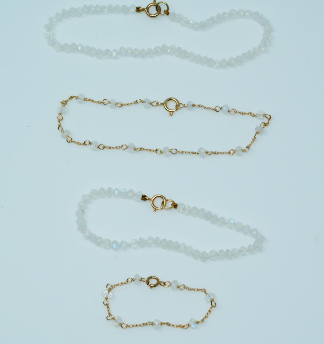 3mm-4mm Faceted Moonstone 14K Mother/Child Bracelets: 3mm-4mm Faceted Moonstone Bead & 14K Yellow Gold Mother/Child Bracelets - This lot includes (2) matching bracelets for a mother and child. The lot includes 7" and 5.5" bracelets comprised of 3mm moons
