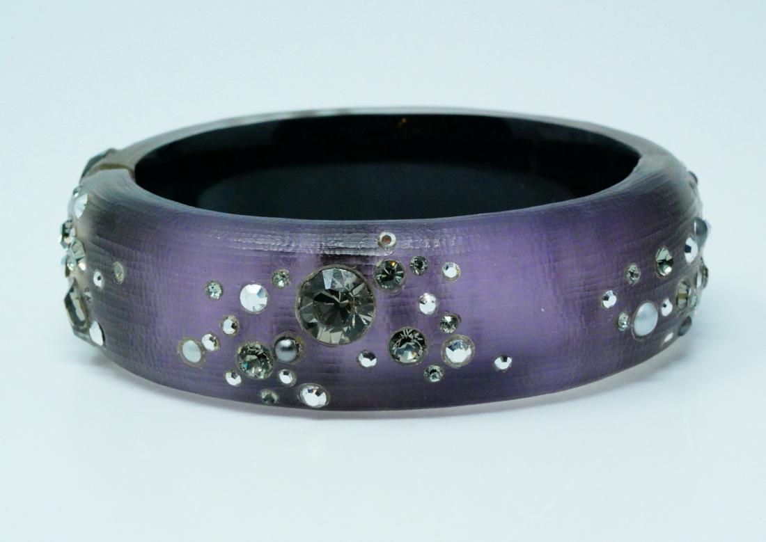 Alexis Bittar Crystal Studded Lucite Bangle: Alexis Bittar Hand Carved Crystal Studded Lucite Bangle Bracelet - This lovely bangle bracelet was made by Alexis Bittar and is crafted from hand carved grey lucite. The lucite has a lovely carved tex