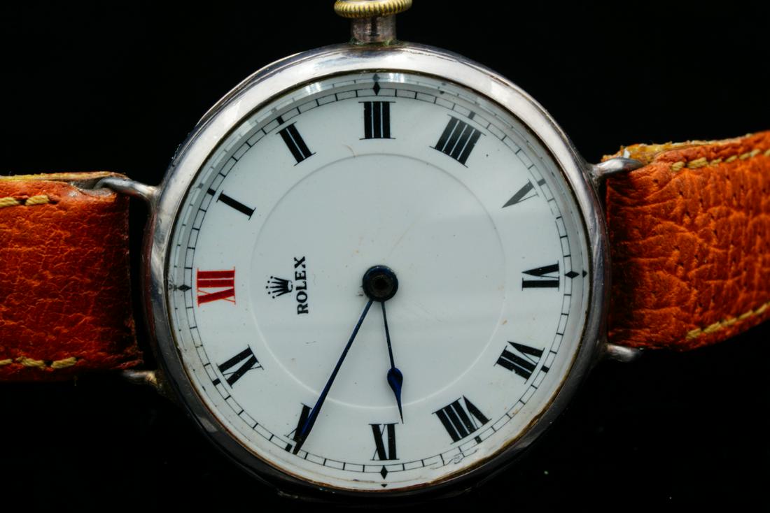 Rolex 1914 33mm Sterling Silver Officers Trench Watch: Rolex 1914 33mm Sterling Silver Manual Wind Officers Trench Watch W/Tan Leather Band - This rare antique timepiece from Rolex is a piece of historical significance from the World War I era. This watch