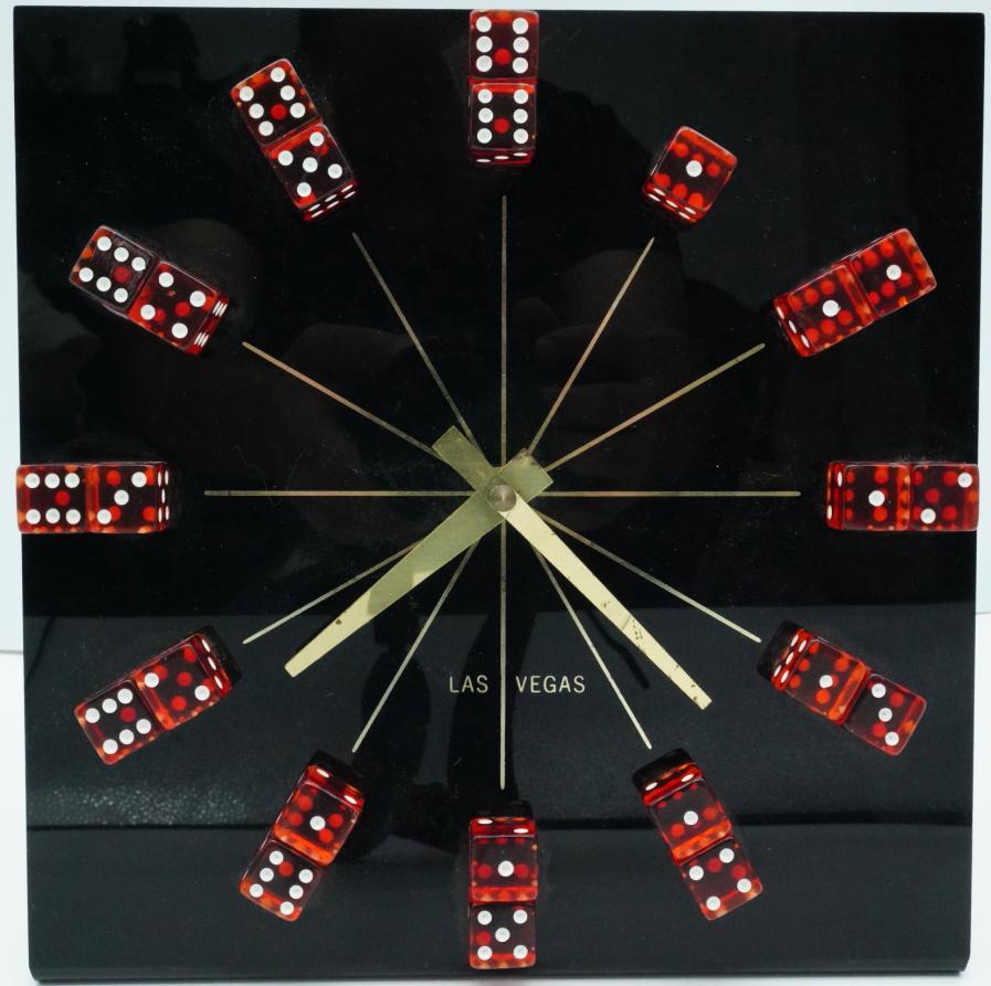 3000 Miles to Graceland Prop Las Vegas Dice Clock: 3000 Miles to Graceland (2001) Prop Las Vegas Dice Clock W/LOA - This black and red mid-century clock was used during the filming of the 2001 crime film, 3000 Miles to Graceland. The clock is black ac