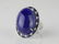 59.80ct Tanzanite Cabochon, 0.95ctw Blue Sapphire &
