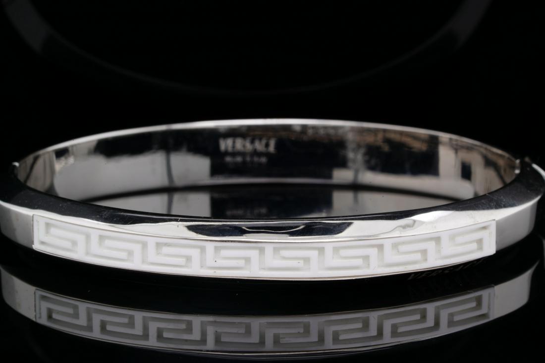 Versace 18K & White Ceramic 8.5mm Wide Greca Bangle: Versace Solid 18K White Gold & White Ceramic 8.5mm Wide Greca Bangle Bracelet - This lovely bangle was made by Versace and was finely crafted of solid 18k white gold and is decorated with the designer