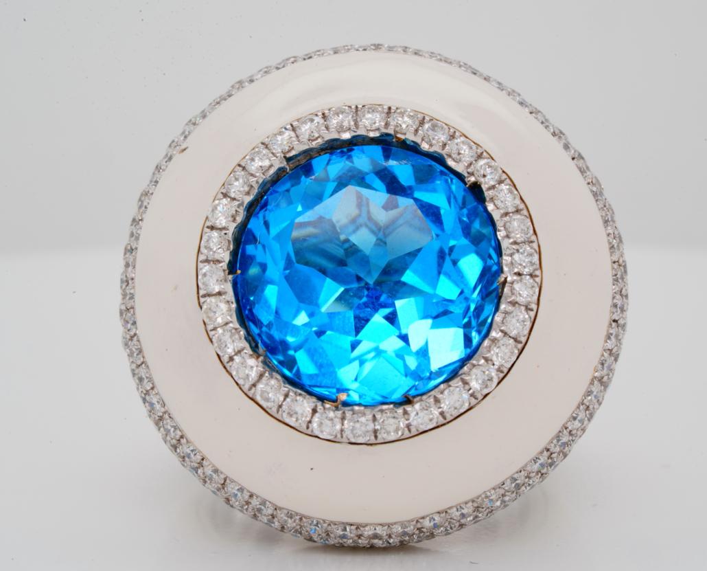 12.00ct Blue Topaz, 2.50ctw Diamond 18K Ring: 12.00ct Blue Topaz, 2.50ctw Black & White Diamond Solid 18K White Gold Ring - This lovely cocktail ring was crafted of solid 18k white gold and boasts a 12.00ct (approximate) round cut blue topaz cent