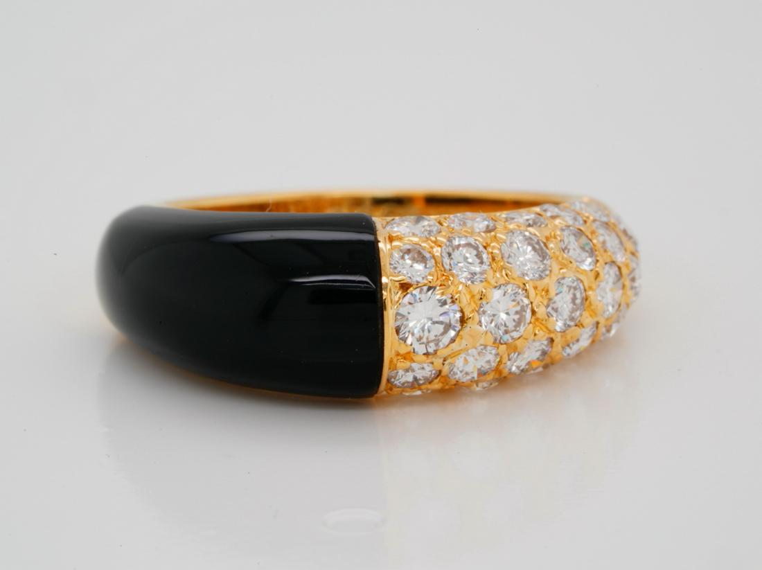 Cartier 1.00ctw Diamond, Onyx & 18K Bombe Ring: Cartier 1.00ctw VS1-VS2/F-G Diamond, Onyx & Solid 18K Yellow Gold Bombe Ring - This beautiful ring by Cartier was finely crafted of solid 18k yellow gold. The ring has a bombe style design and is deco