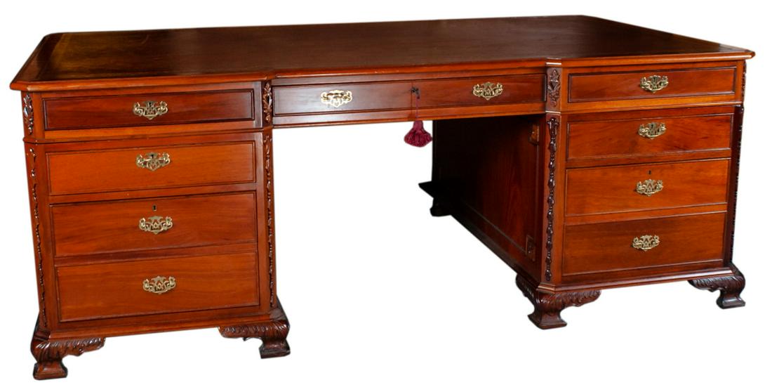 Chippendale Style Wood Executive Desk: Chippendale Style Wood Executive Desk- This is a beautiful wooden Chippendale style executive desk with seven locking drawers and ornate gold hardware. The drawers have a locking mechanism and this de