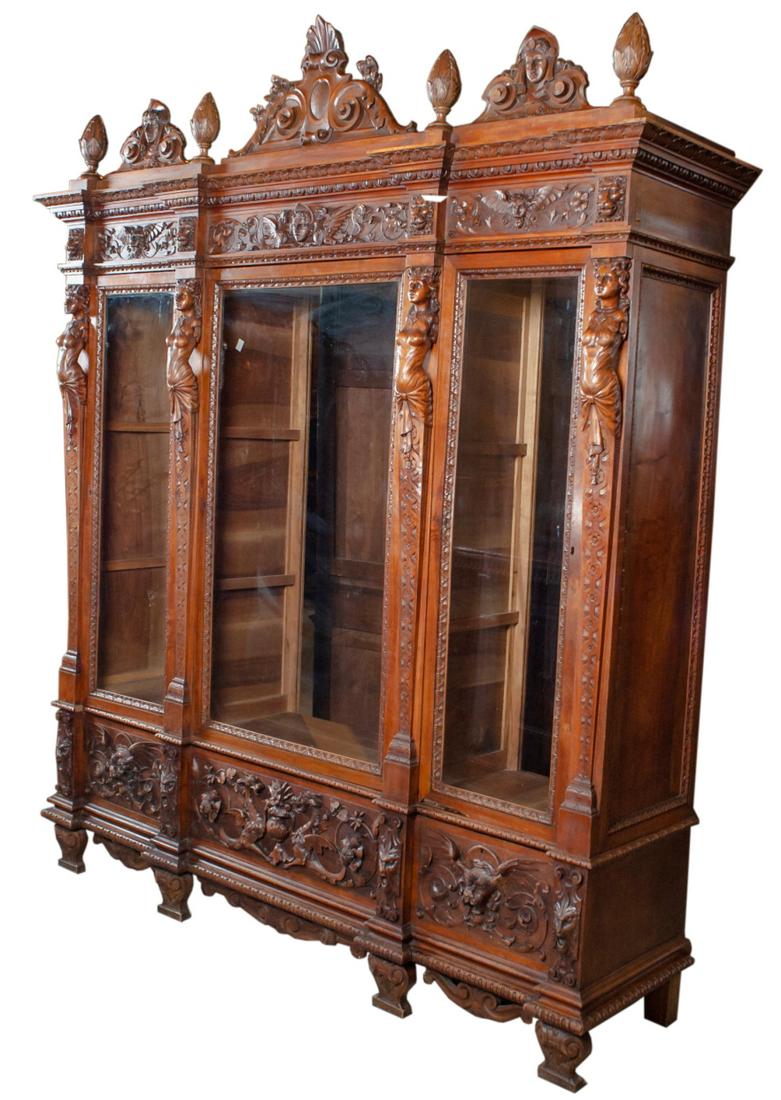 Antique Ornate Wooden Cabinet W/High Relief Figures: Antique Ornate Carved Wooden Cabinet W/High Relief Figural Details & Glass Doors - This exceptional antique piece is heavily carved with ornate high relief lions, dragons, and nude women. The cabinet 