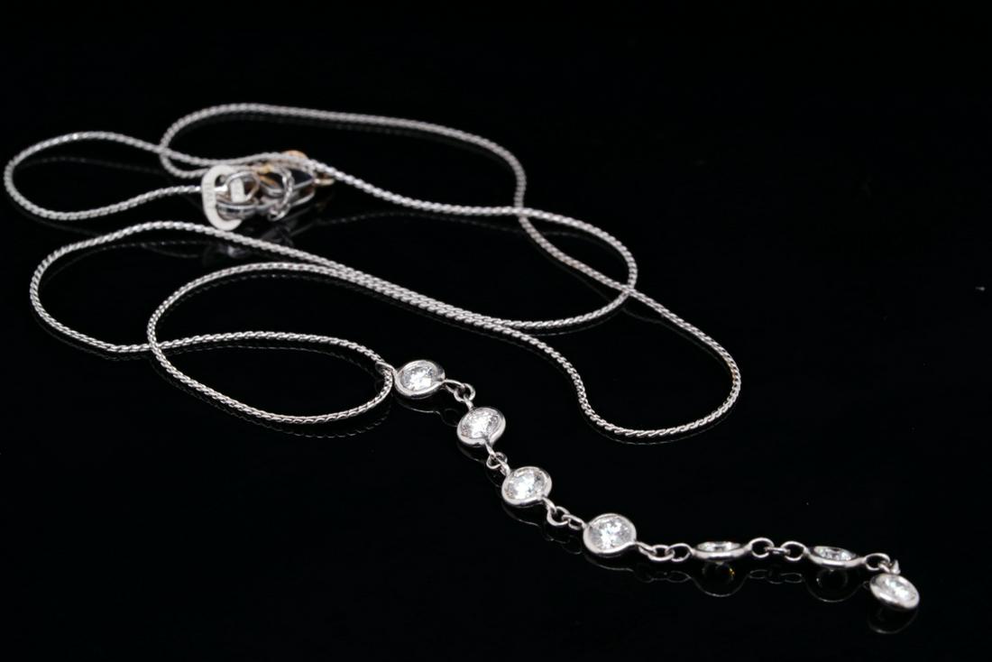 Italian 0.35ctw SI1-SI2/G-H Diamond 14K Necklace: Italian 0.35ctw SI1-SI2/G-H Diamond Solid 14K White Gold 14.5" Lariat Necklace - This lovely necklace is made of solid 14k white gold and has a lariat style design with a 2" pendant lined with approxi