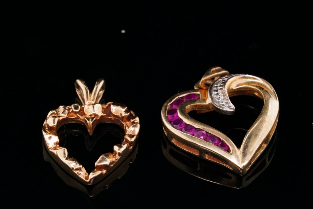 Lot of (2) Solid 10K Yellow Gold Heart Charms: Lot of (2) Solid 10K Yellow Gold Heart Charms - This lot includes (2) solid 10k yellow gold heart charms. The lot includes one 0.75" solid gold heart and one 0.85" heart which is decorated with approx