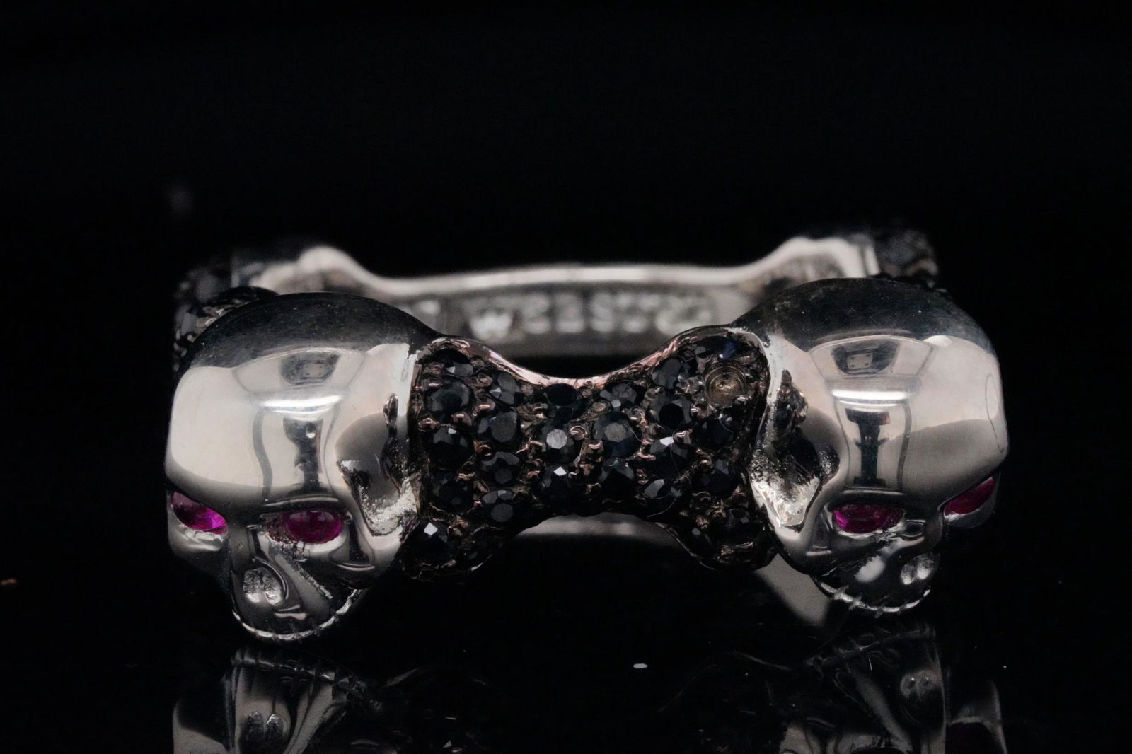 Stephen Webster Black Sapphire & Sterling Silver Ring: Stephen Webster 2.80ctw Black Sapphire, 0.25ctw Ruby and Solid Sterling Silver Skull and Bones Ring - This Skull and Bones ring from Stephen Webster is made of solid sterling silver and has two 3d sku