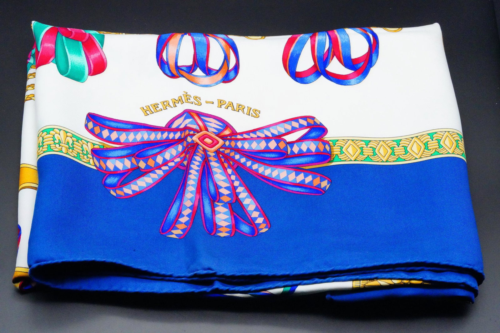 Hermes Les Rubans du Cheval Twill Silk Scarf 90: Hermes Les Rubans du Cheval Twill Silk Scarf 90 (100% Silk) - This exquisite silk scarf from Hermes features the Les Rubans du Cheval motif which was designed by Joachim Metz in 1993. Hermes scarves a