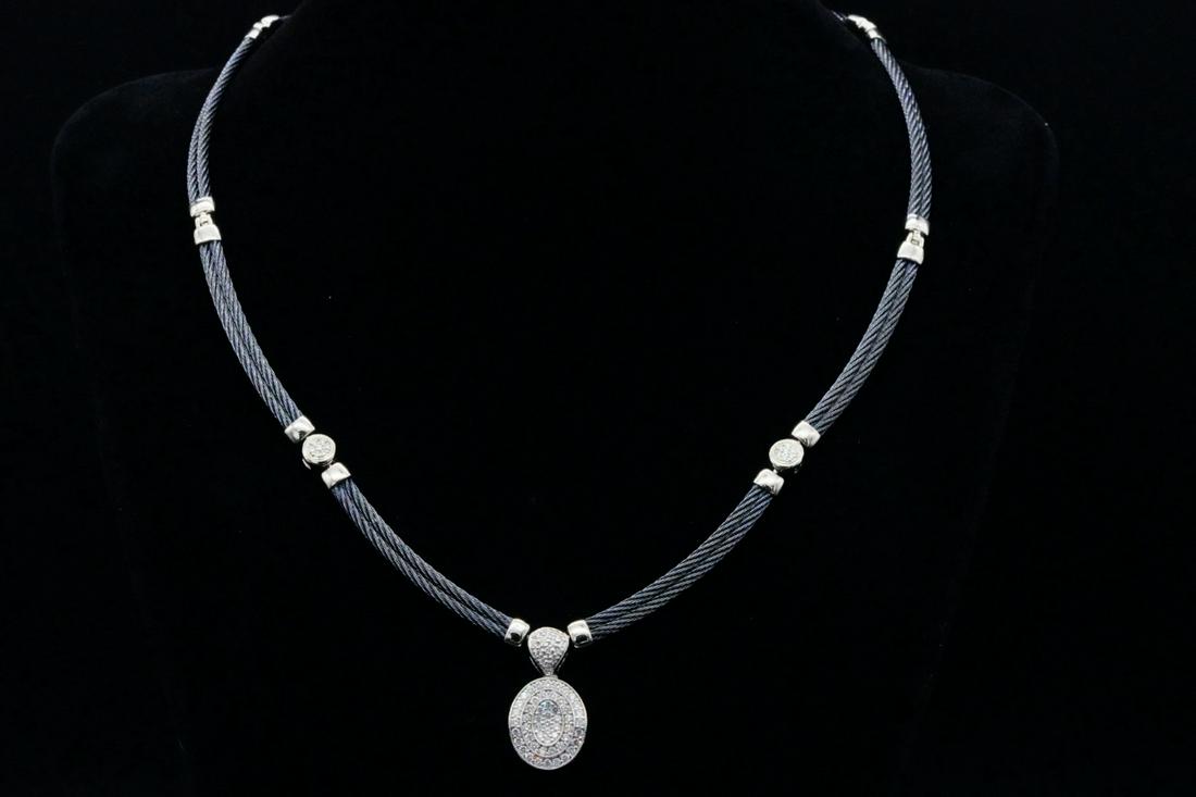 Charriol 0.60ctw Diamond, 18K & Steel Cable Necklace: Charriol 0.60ctw Pave Diamond, 18K White Gold and Black Steel Cable Necklace - This lovely necklace was made by Charriol and is crafted of two black steel cables with 18k white gold pendant and insert