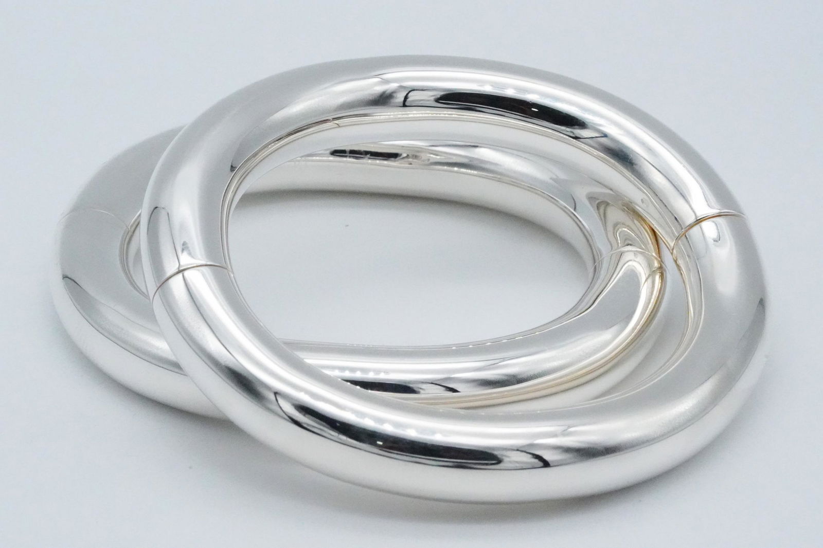 Hermes Pair Of Sterling Silver Lima Bangle Bracelets