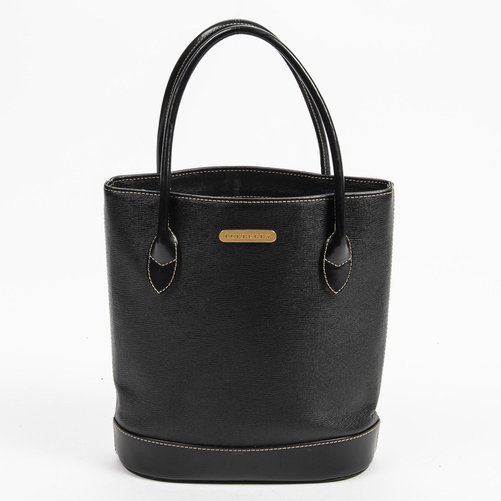 Burberry Black Grained Calfskin Leather Square Tote: Burberry Black Grained Calfskin Leather Square Tote - This Square Tote from Burberry is crafted of black grained calfskin with a smooth calfskin trim and rolled top handles. The bag is finished with a