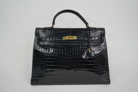 Hermes Vintage Black Crocodile Kelly Sellier 35: Hermes Vintage Black Crocodile Kelly Sellier 35 W/Gold Hardware (Comes W/Dust Cover and Service Receipt) - This lovely handbag is the iconic Kelly bag by Hermes, constructed of the coveted shiny black