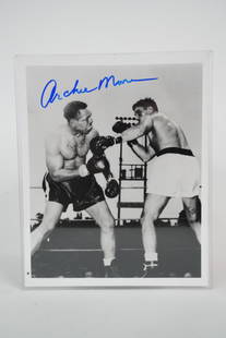 Signed Archie Moore Photograph, with Joey Maxim: Signed Archie Moore Photograph, with Joey Maxim, 1952 W/COA - This rare photograph, hand-signed by legendary boxer Archie Moore, depicts the World's Championship light heavyweight match between Archie