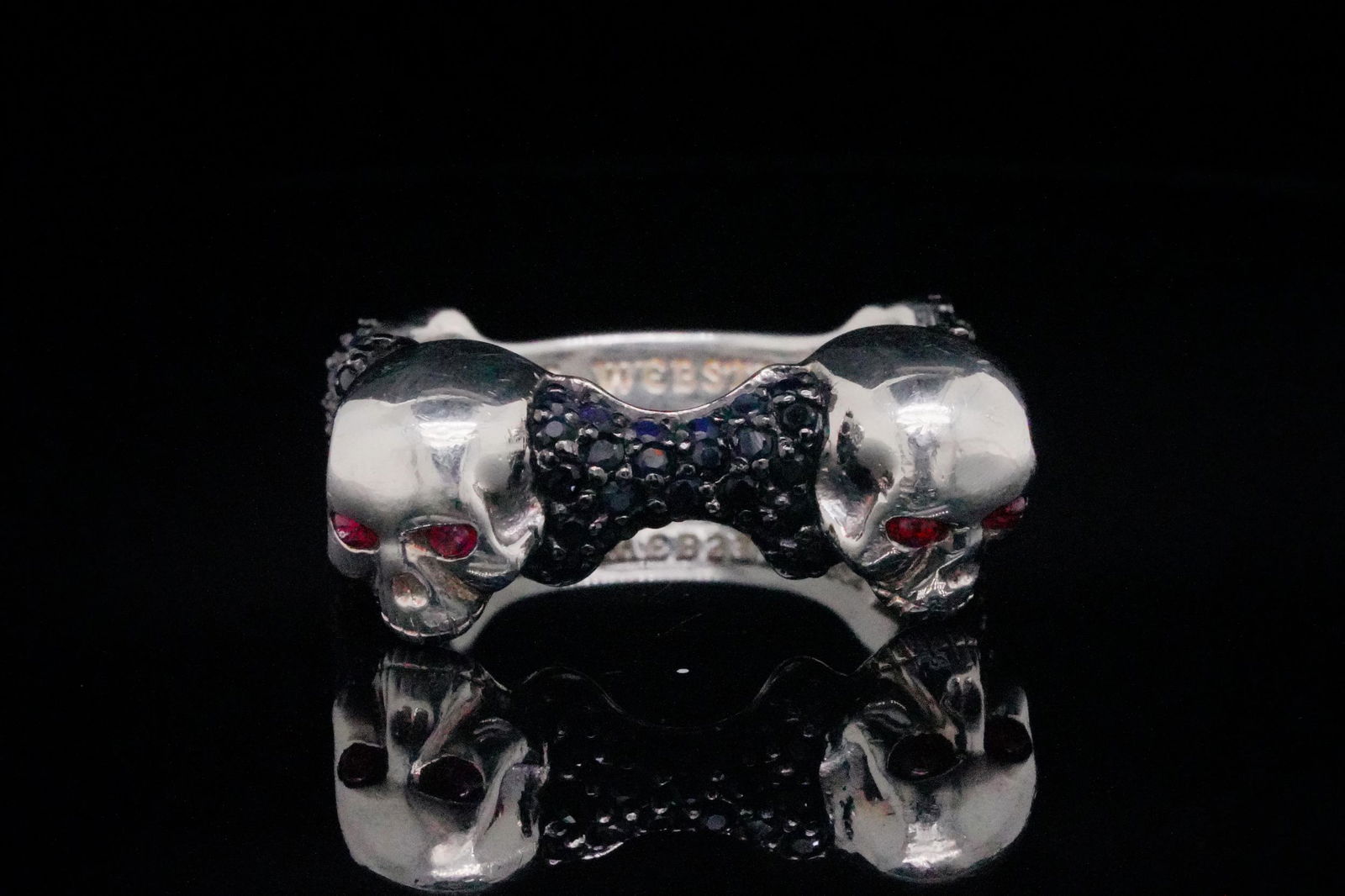 Stephen Webster Black Sapphire and Sterling Silver Ring: Stephen Webster 2.80ctw Black Sapphire, 0.25ctw Ruby and Solid Sterling Silver Skull and Bones Ring - This Skull and Bones ring from Stephen Webster is made of solid sterling silver and has two 3d sku