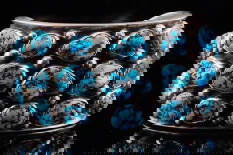 Native American Turquoise and Sterling Silver Cuff: Native American 8.5mm-16.5mm Turquoise and Solid Sterling Silver Cuff Bracelet - This lovely vintage cuff was crafted of solid sterling silver and is decorated with 8.5mm-16.5mm turquoise stones in a
