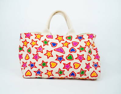 Prada Multi-Color Printed Canvas Large Canapa Tote: Prada Beige Multi-Color Printed Canvas Large Canapa Tote W/Card - This Prada Large Canapa Tote is crafted in beige canvas with multi-color star and heart print and a Prada logo on the front and plaque