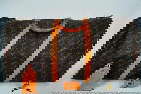 Louis Vuitton Vintage Monogram Canvas Keepall 55: Louis Vuitton Vintage Monogram Canvas Keepall 55 Duffel Bag - This Keepall 55 duffel bag from Louis Vuitton is crafted in the signature Monogram canvas with Vachetta leather trim and gold tone brass h