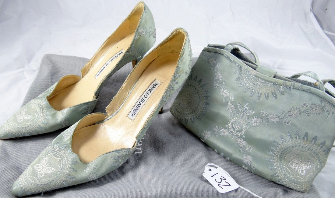 Manolo Blahnik Heels W/Matching Evening Bag: This is a pair of blue satin heels with floral designs & matching evening bag. They are marked "Made in Italy". The shoes are approx. size 7.5 in womens. No tears or rips.