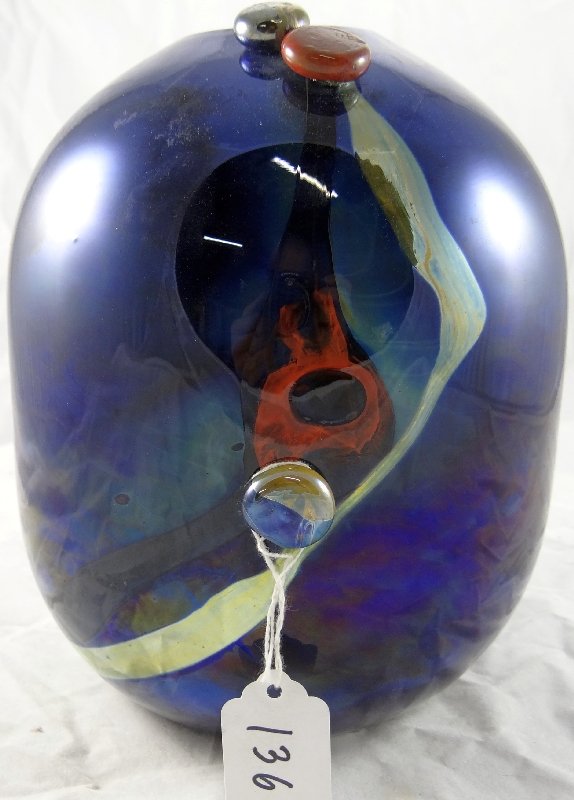 *Signed* Joan Reep "Silver Glass" Vase: Joan Reep is known for her unusual style that is like no other. This is a rare & unique piece. There is a mixture of dark blues, heavy purples, reds, & yellows swirling through out the piece. This is 