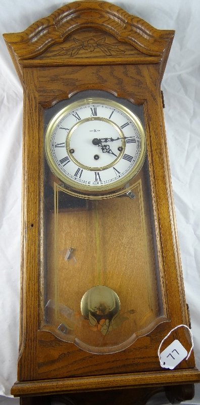 Vintage Howard Miller Triple Chime Clock: Model No. 612-578. The clock is in beautiful condition & has the keys with it. Approx. 30"x11"x7"