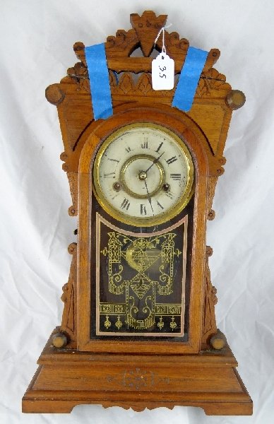 Antique New Haven Clock Co. Wall Clock: Antique New Haven Clock Co. "One Day Mercy Striking" Wall Clock. The clock is not working & the top decoration is broken.
