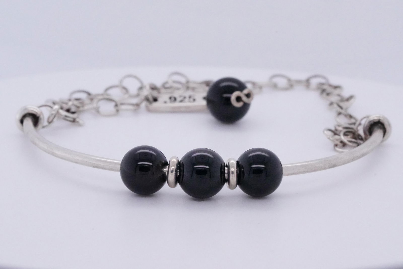 King Baby 8mm Onyx Bead and Sterling Silver Anklet: King Baby 8mm Onyx Bead and Sterling Silver 10" Extension Chain Anklet - This anklet was made by King Baby and is made of solid sterling silver. The anklet has a curved barrel with 8mm onyx beads and