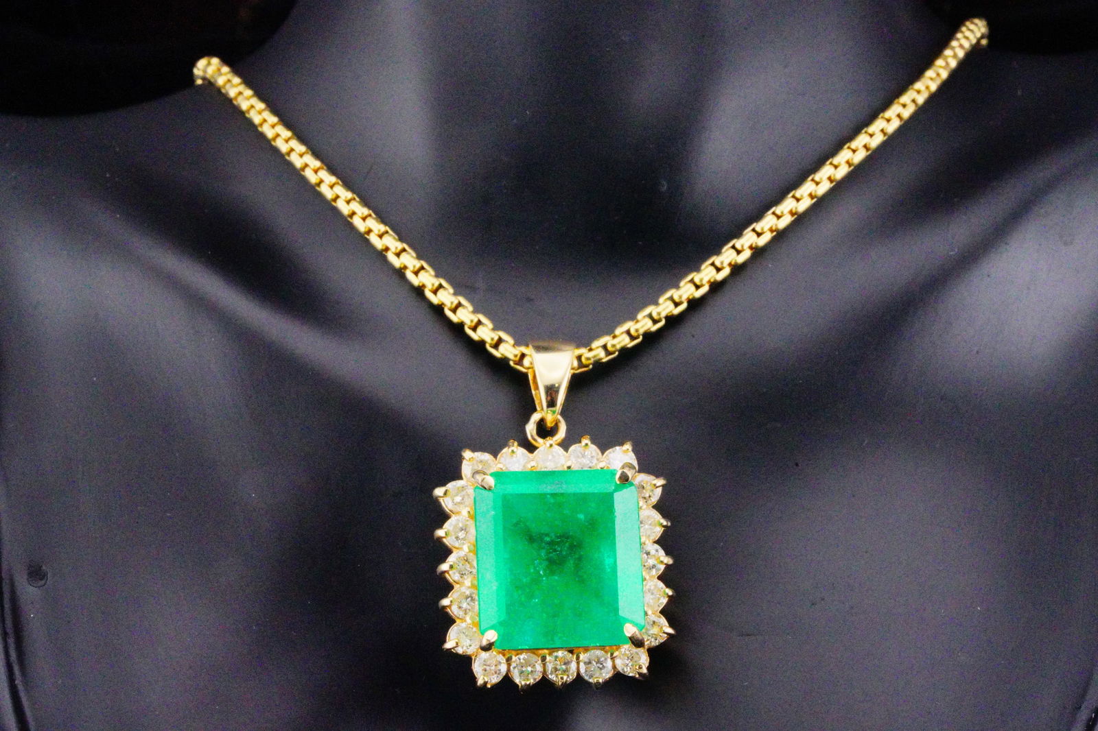 Bibi Hilton's 25.72ct Emerald, 2.75ctw Diamond, 14K/18K Necklace: Bibi Hilton's 25.72ct Emerald, 2.75ctw Diamond and 14K Yellow Gold Pendant on David Yurman 18K Chain W/AIG Report (From the Estate of Mrs. Bibi Hilton) - This exquisite necklace was owned and worn by