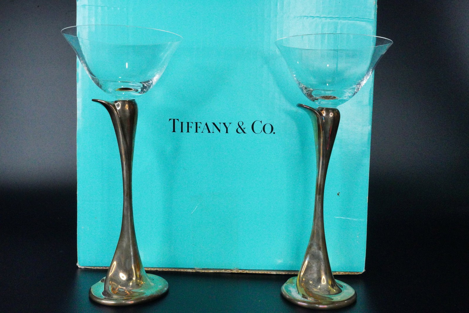 Bibi Hilton's Tiffany & Co. Elsa Peretti Champagne Glasses: Bibi Hilton's Pair of Tiffany & Co. Elsa Peretti Sterling Silver and Crystal Champagne Glasses W/Box (From the Estate of Mrs. Bibi Hilton) - This pair of Tiffany & Co. champagne glasses were designed 