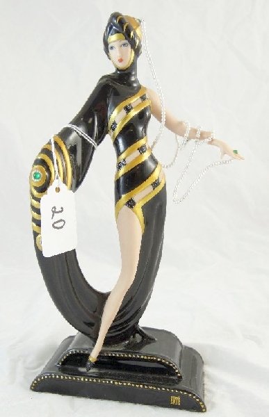 House of Erte "Pearls & Emeralds" Figurine: Franklin Mint House of Erte "Pearls & Emeralds" Figurine. This is a beautiful, elegant, & highly collectible piece. The figurine depicts an exquisite lady draped in pearls & emeralds. The piece is ful