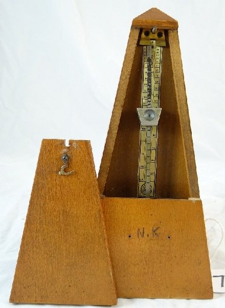 Vtg Seth Thomas Wood "De Maelzel" Metronome: Vintage Seth Thomas Cherry Wood "De Maelzel" Metronome. The metronome is in excellent working condition. This instrument provides the rate of speed at which a piece of music is to be played. Approx. 9