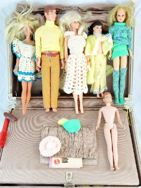 Vtg. Barbie Collection/Vtg. Samsonite Case: Vintage Barbie Collection In Vintage Samsonite Case. In the case is extra clothes for the barbies. There are 1963, 1965, 1966, & 1968 barbies. The Samsonite case measures approx. 15"x10". Est. value $
