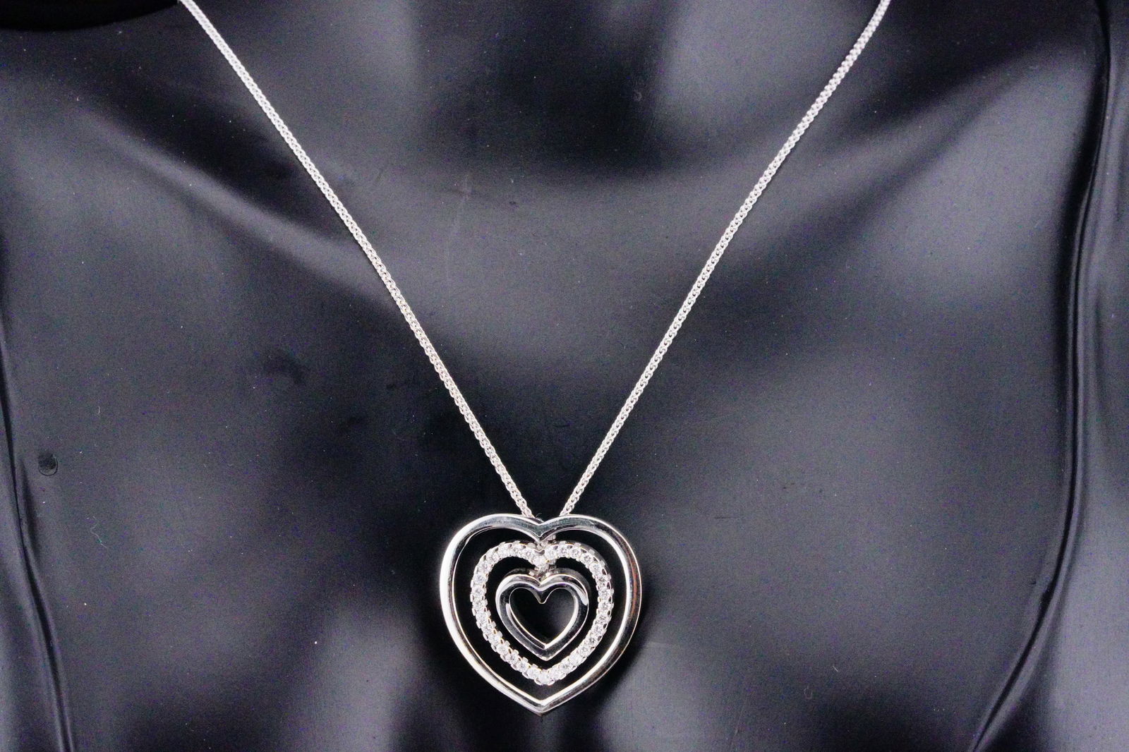 Chimento 0.40ctw Diamond and 18K White Gold Heart Necklace: Chimento 0.40ctw Diamond and 18K White Gold 18" Heart Pendant Necklace - This necklace was made by Chimento and crafted in 18k white gold. The necklace features a 1" heart pendant embellished with app