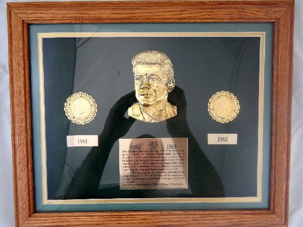 John F. Kennedy Commemorative Coin Set: Limited Edition John F. Kennedy Commemorative Coin Set W/COA-This is a museum quality piece that contains one 1964 Kennedy half dollar & one other Kennedy half dollar w/bezels plated in 24K gold & 10