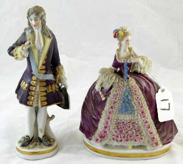 Lot of (2) Antique Capodimonte Figurines: There is a figurine of a gorgeous lady & one of a man. These figurines are believed to be from the late 18th century. Both of the figurines have the Capodimonte "crown over n" back stamp. Both of the