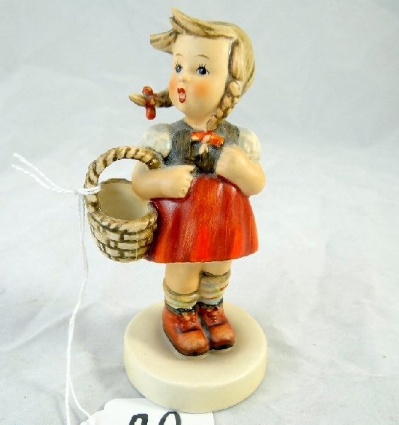 1960-1963 Hummel Girl With Basket Figurine: The piece has the Hummel back stamp is marked "W. Germany" & numbered 96. The figurine is in good condition aside from a small chip on the girls hair. Approx. 5" tall.