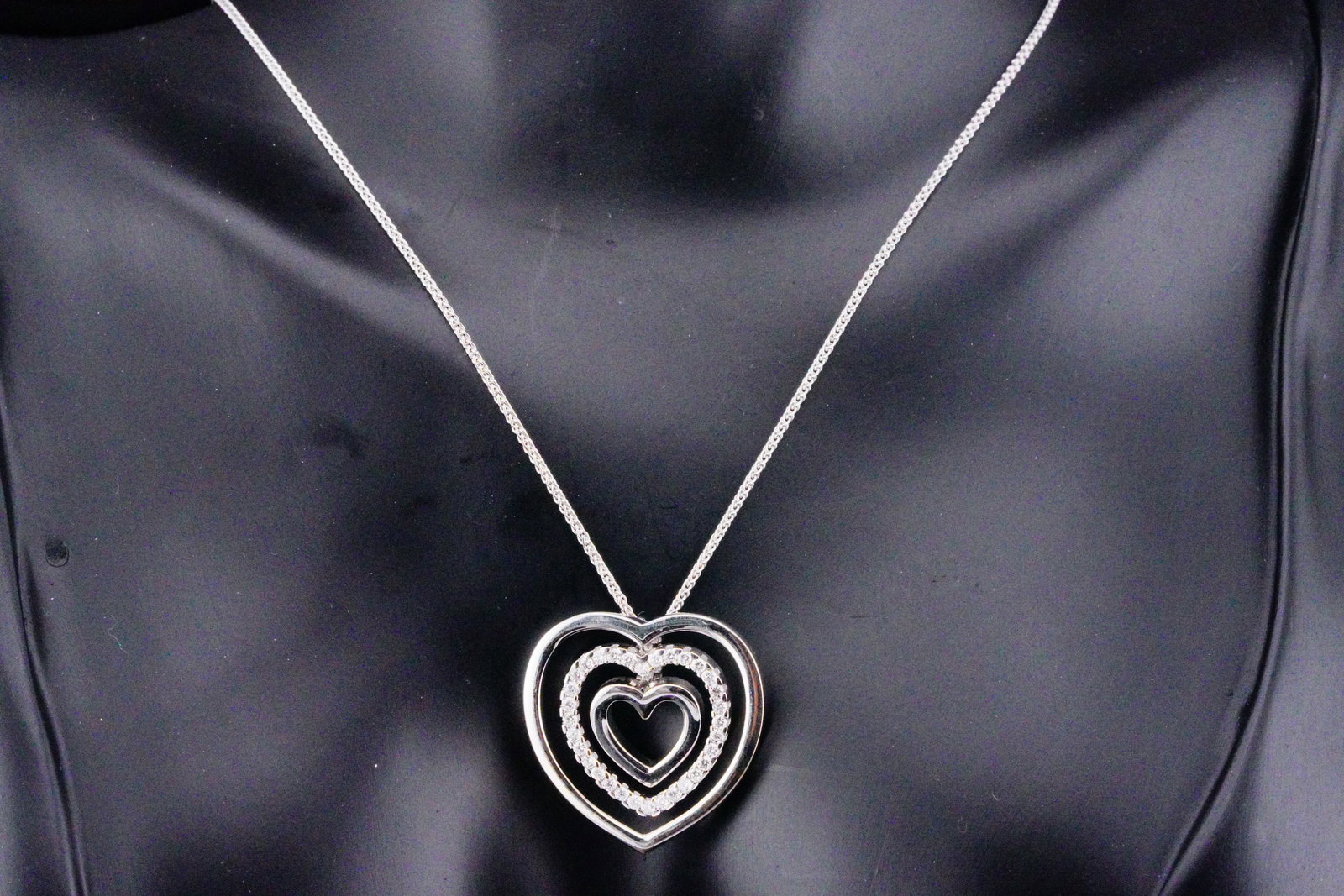 Chimento 0.40ctw Diamond and 18K White Gold Heart Necklace: Chimento 0.40ctw Diamond and 18K White Gold 18" Heart Pendant Necklace - This necklace was made by Chimento and crafted in 18k white gold. The necklace features a 1" heart pendant embellished with app